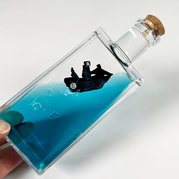 دکوراتیو کشتی شناور طرح بطری مدل دزدان دریایی کارائیب